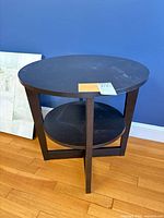 Full view of round two-tier end table front