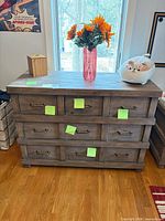 front view of dresser showing nine drawers and hardware