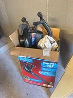 Box containing Toro leaf blower/vac, bag, tubes