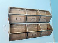 Front view of both organizers showing six compartments and mesh fronts