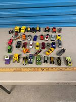 Overview of entire lot laid out in rows on table