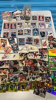 Overhead view of entire lot showing hockey cards, puck in display case, price guide