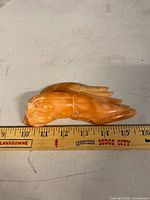 full figurine beside ruler showing 6 inch length