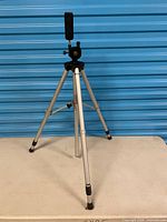 Full view of aluminum tripod extended