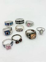 Top view of all ten rings displayed on white background