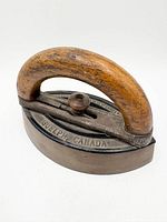 oblique view showing handle, clamp and Guelph Canada embossing