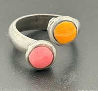 Ring showing bypass design and enamel colours
