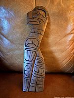 Front view showing carved eagle design