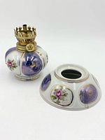 Lamp assembled: porcelain body with brass burner, separate porcelain dome shown beside it