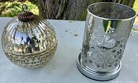 Both candle holders side by side showing overall forms