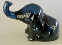 Left-side view of glossy ceramic elephant