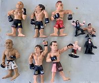 All 12 figures arranged on tabletop