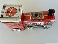 Side view of locomotive tin showing graphics and wheels