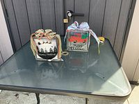 Both lighted glass blocks on table, overall view