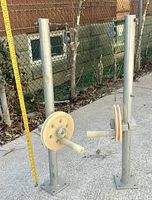 Both pole reel mounts standing side by side showing full structure