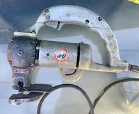 Overall view of the Black & Decker electric hand shear showing body, handle and cord