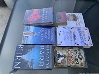 All seven books laid out