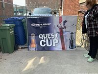 Front view of Bud Light Quest For The Cup banner displayed on fence