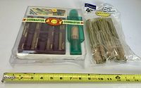 Overall lot showing Coinmaster kit and coin wrapper pack with measuring tape