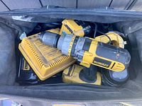 Top view into bag showing drill, chargers, batteries