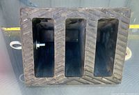 Front view showing three interior channels and eye bolt