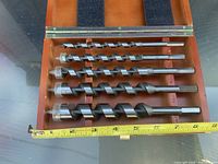 Open Mastercraft box with auger bits inside