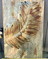 Front view showing entire embossed leaf design