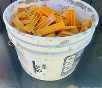 pail side view with visible shims