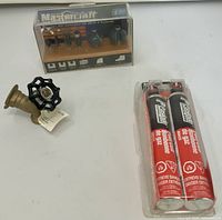 Overall lot with router bit set, hose bibb, and sealed Paslode fuel cells