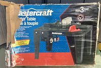 Front of damaged box showing Mastercraft Router Table image and branding