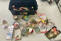 open tackle box with all accessories spread out
