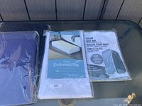 Packaged Whitmor Underbed Bag, Suit Bag, sealed purple storage bag