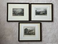 Three framed engravings grouped together