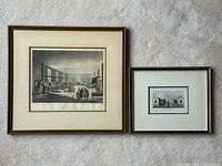 Both framed engravings side by side