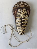 Front view showing full mask and cord