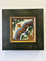 Front view of framed Spanish Seville tile