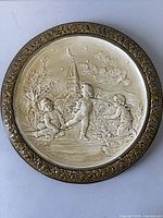 Front view showing entire relief scene and border