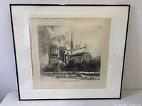 Full view of framed etching with mat and frame visible