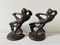 Front view of both Hubley nude dancer bookends