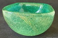 Side angled view showing colour, shape and internal bubbles