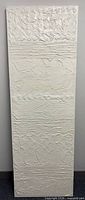 Full view of the 72" x 24" textured white painting
