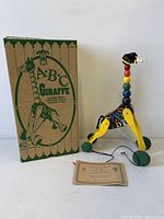 pull toy, box, certificate overall view