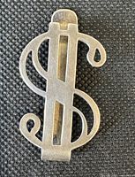 Front view of sterling silver dollar sign money clip