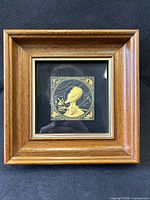 Front view of framed damascene artwork