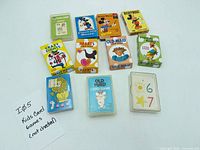 Group shot showing all ten boxed card sets with identifying graphics