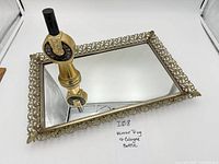 Tray and cologne bottle overall view