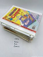 Stack of bagged Richie Rich comics, top issue Richie Rich and Casper
