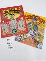 Front covers of both programs, 1970 red edition and 1982 orange edition