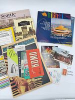 Group shot of books, record, brochures, postcards, envelopes