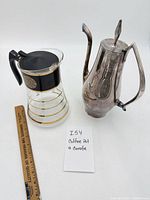 Overall view of both items with ruler for scale